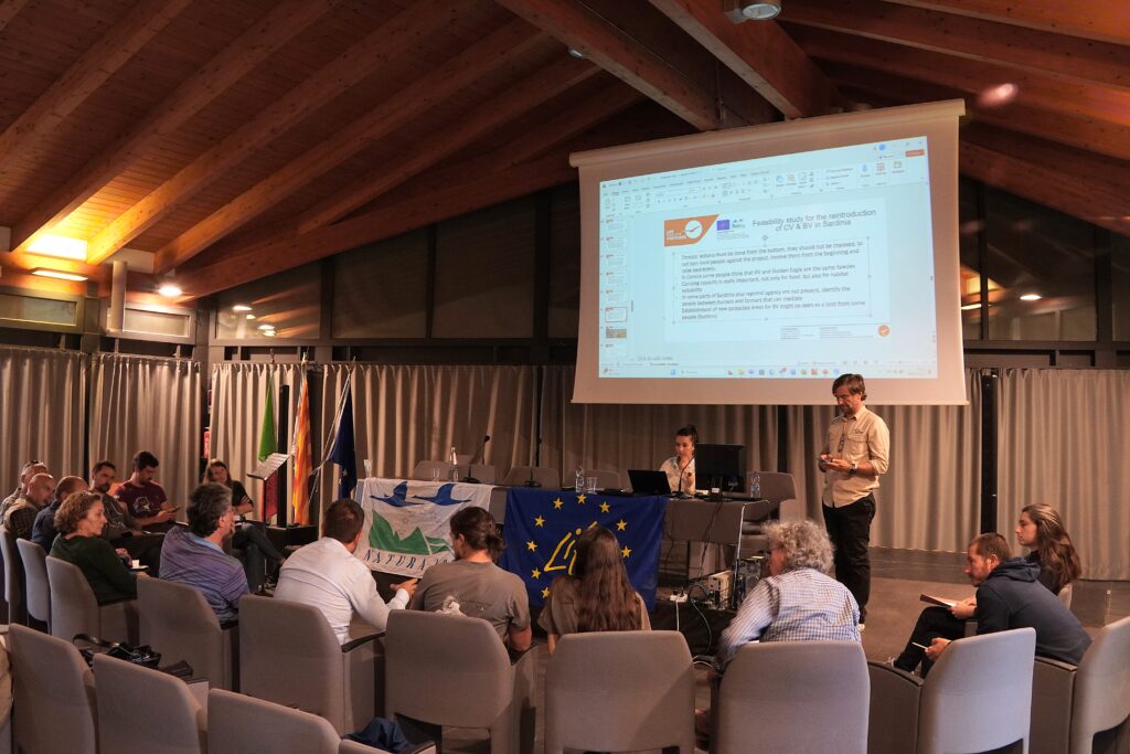group of people discussing cinereous vulture conservation in Sardinia